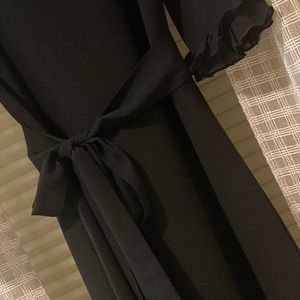 Dainty Jewell’s black knit dress- size M